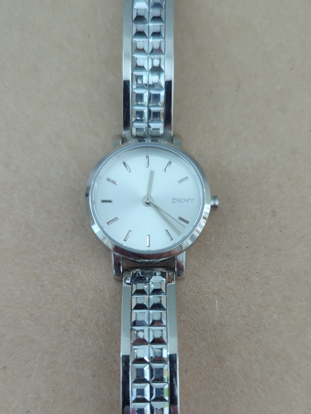 DKNY Silver and White Women's Bracelet Watch - Minimalist Dial